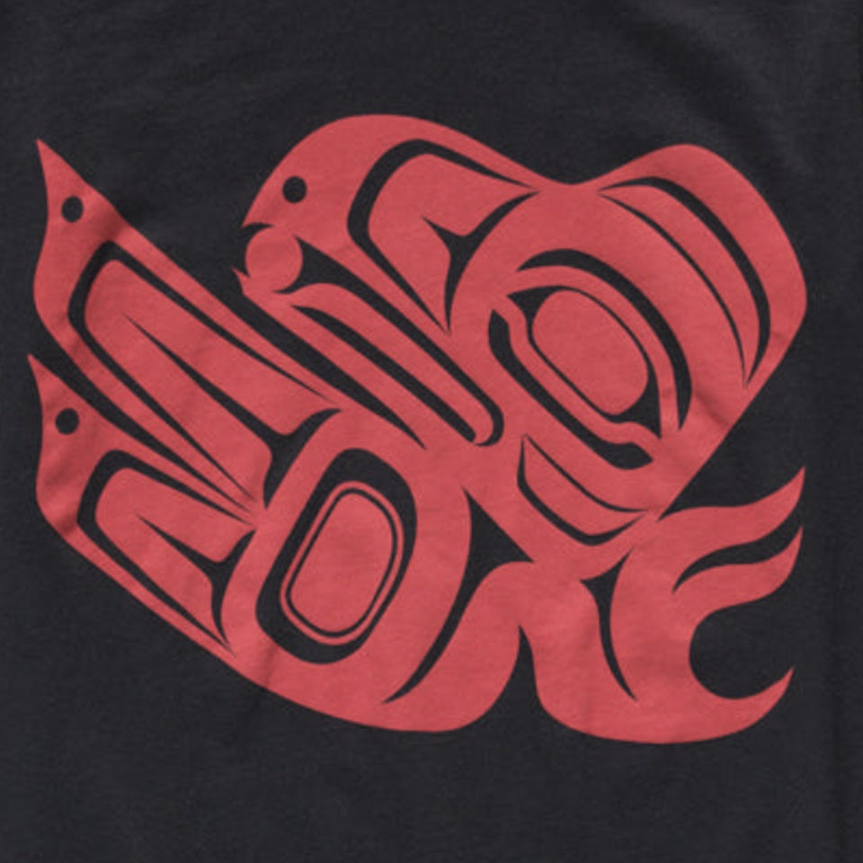 Close up of Native American designed t-shirt with red raven on black t-shirt