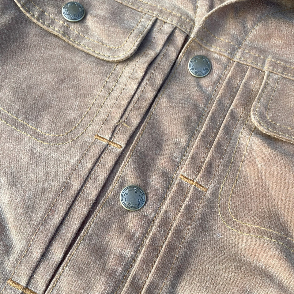 Women's brown wax canvas coat with colorful, southwest Pendleton wool lining with Native American Ginew tag