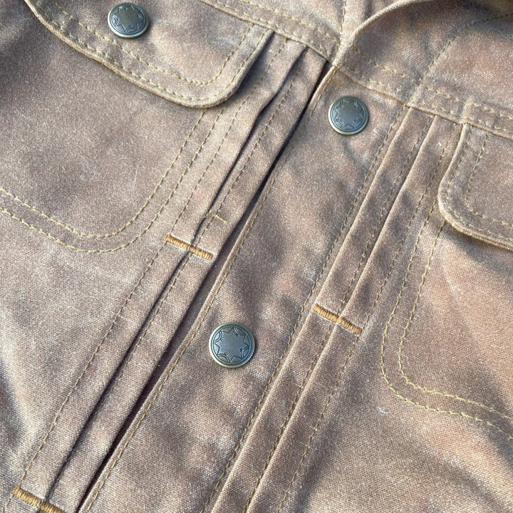 Women's brown wax canvas coat with colorful, southwest Pendleton wool lining with Native American Ginew tag