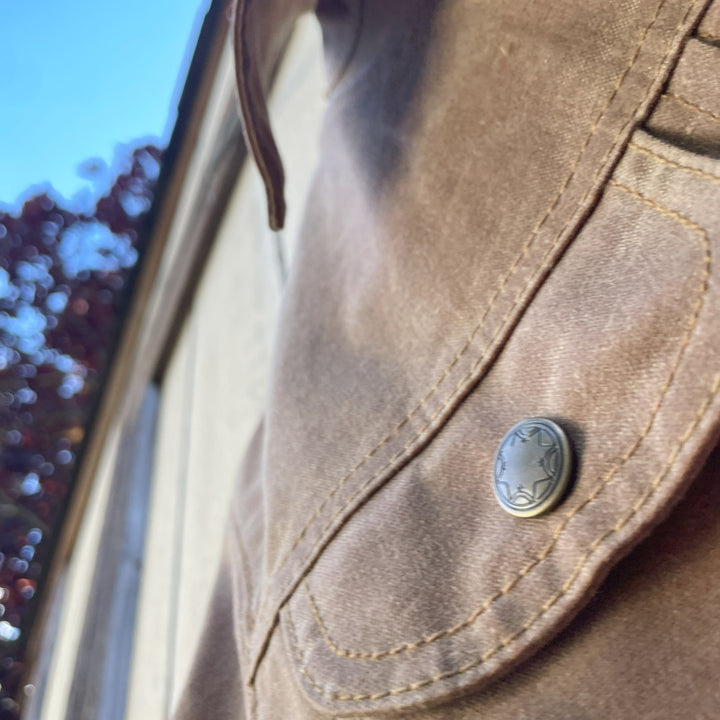 Pocket on Womens brown wax canvas coat with Pendleton wool black and red lining by Native American Ginew 