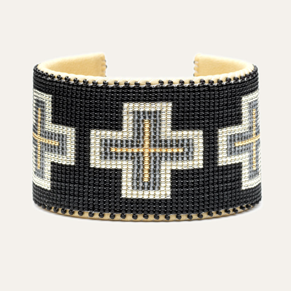 Black, silver and gold design; Hand-beaded bracelet; white background