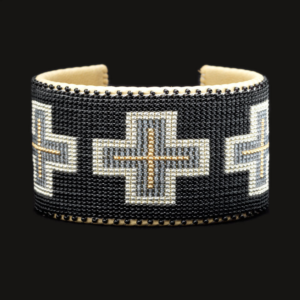 Black, silver and gold design; Hand-beaded bracelet; black background