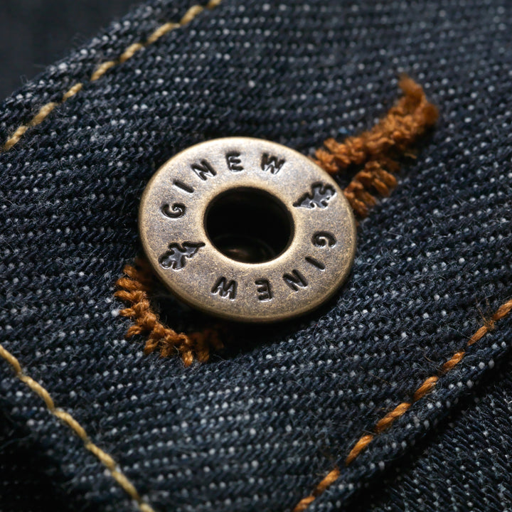 Detail view of Custom Ginew® Brass & Copper Hardware button