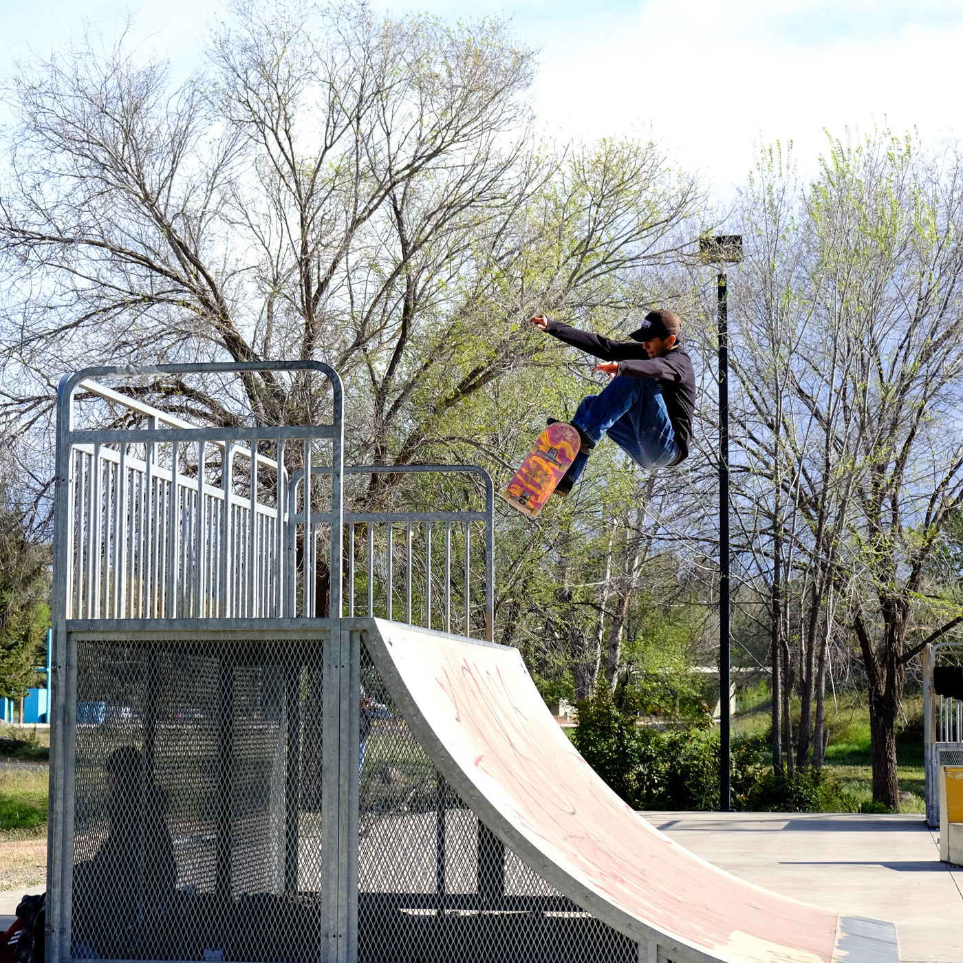 Daquon Cassaway skates a ramp in his Warm Springs Skatepark tee