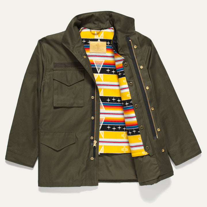 Military-style green coat with removable wool vest lining in yellow and orange. 