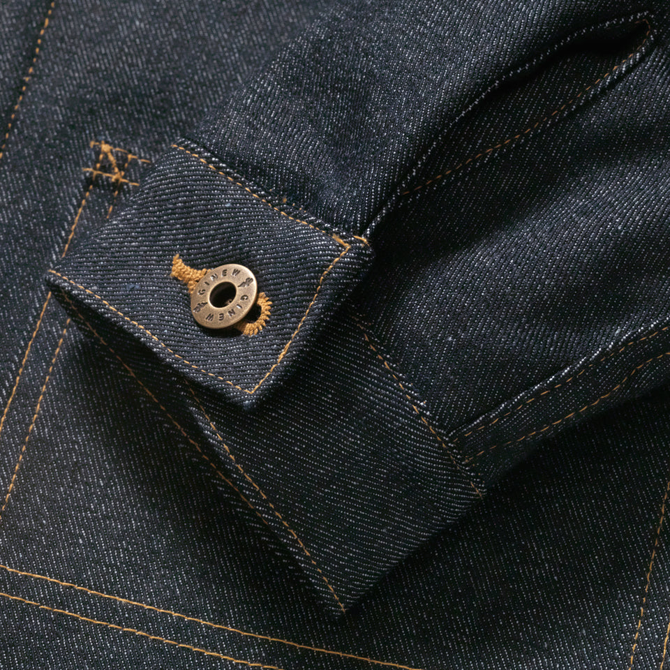 Close up view of the sleeve cuff with custom Ginew button