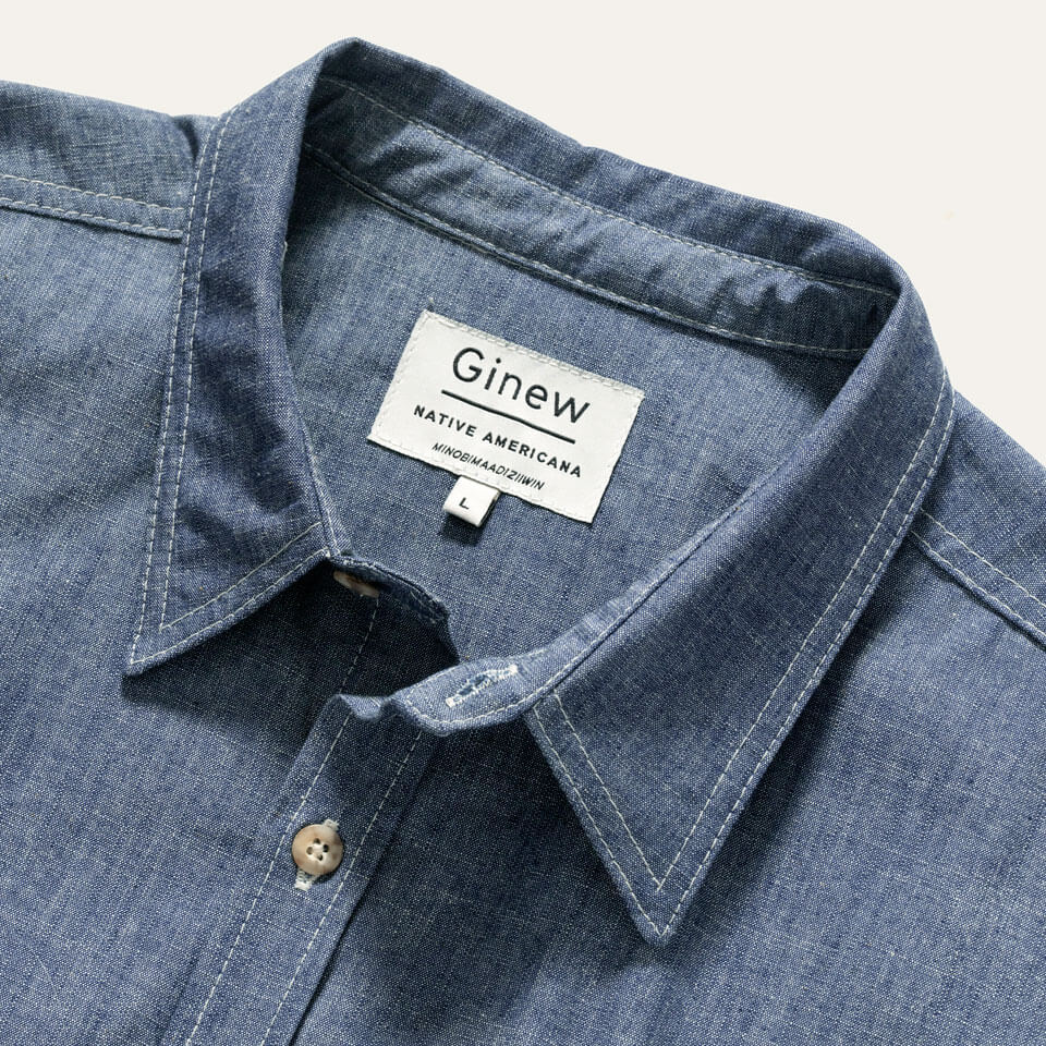 Light blue cotton, 100% All cotton chambray shirt made in USA by Ginew tag.