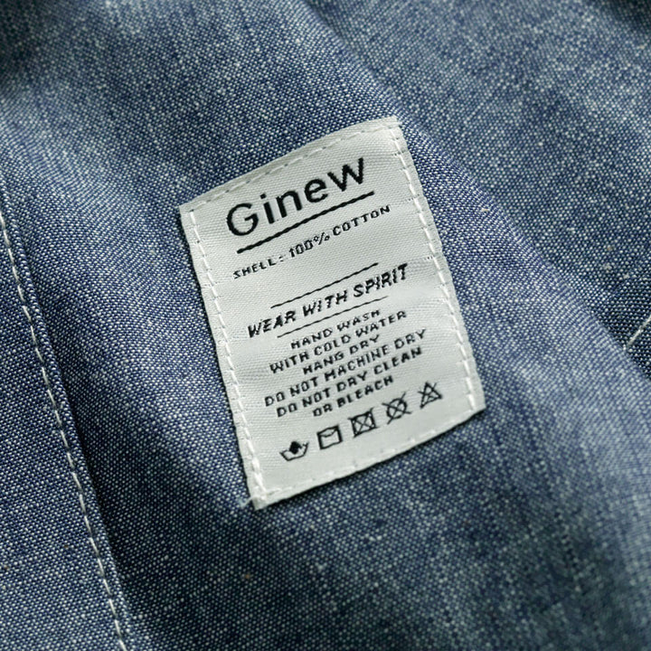 Tag detail on blue chambray button down made in USA by Native American Ginew
