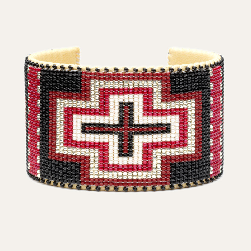 Black, silver, white and red design; Hand-beaded bracelet; white background