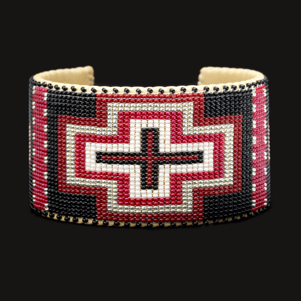 Black, silver, white and red design; Hand-beaded bracelet; black background