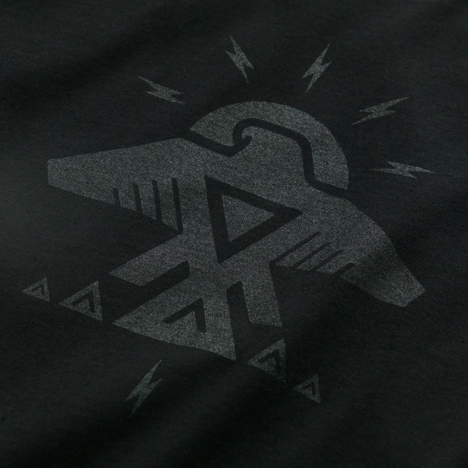 Close up of Thunderbird Graphic in a 100% cotton made in USA, black-on-black design