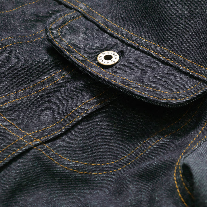 Button and custom Ginew hardware on selvedge denim coat