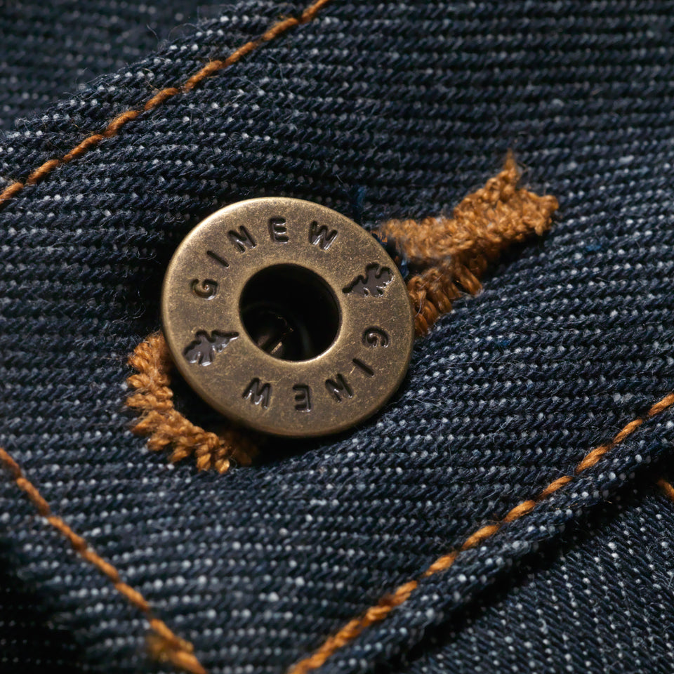 Selvedge Denim jean and Close up of custom Ginew buttons.