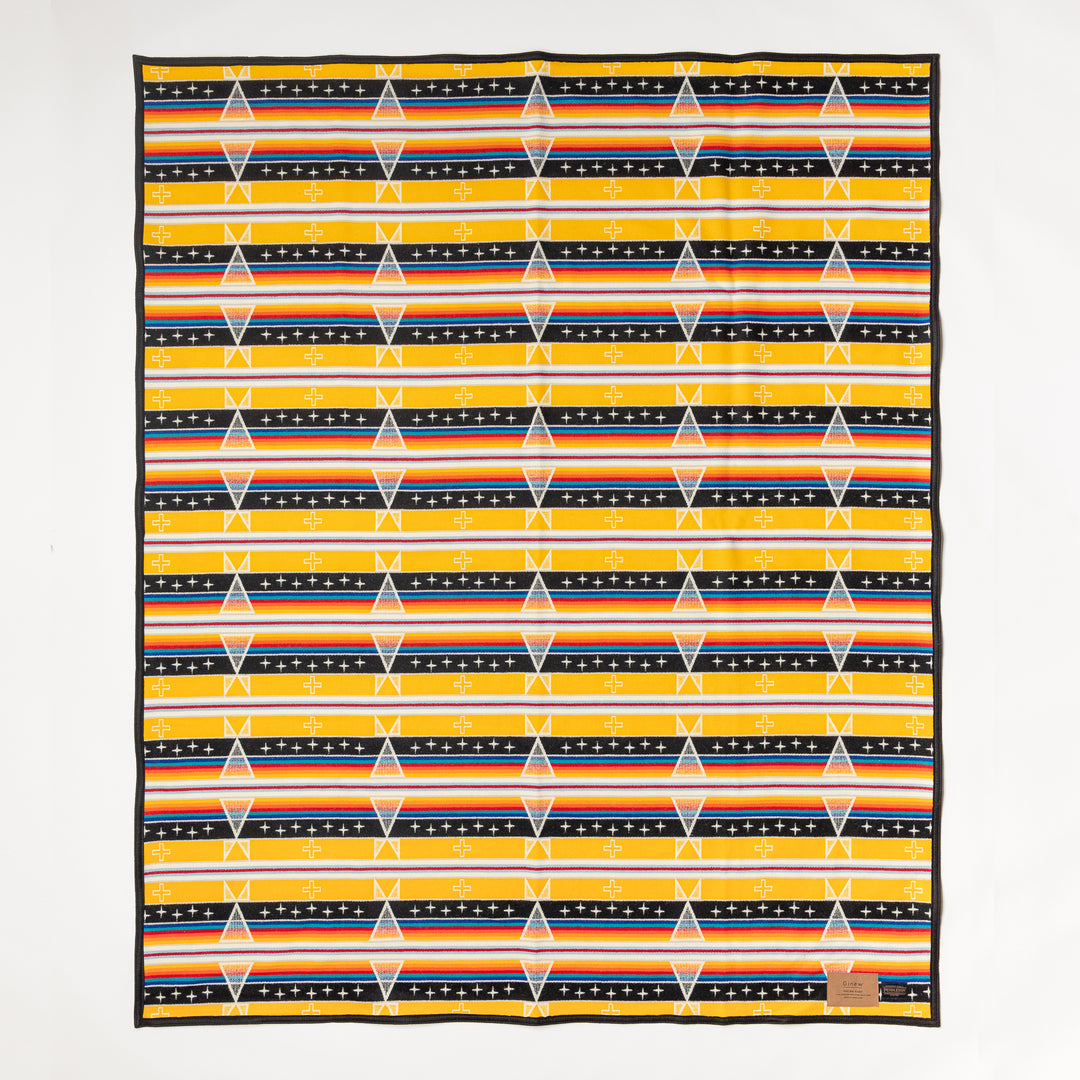 Yellow wool and cotton blanket made in USA. Yellow, orange, white, black. Ginew: Native American-owned.