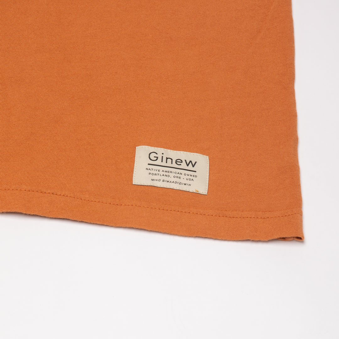 Ginew tag on 100% cotton t-shirt made in USA