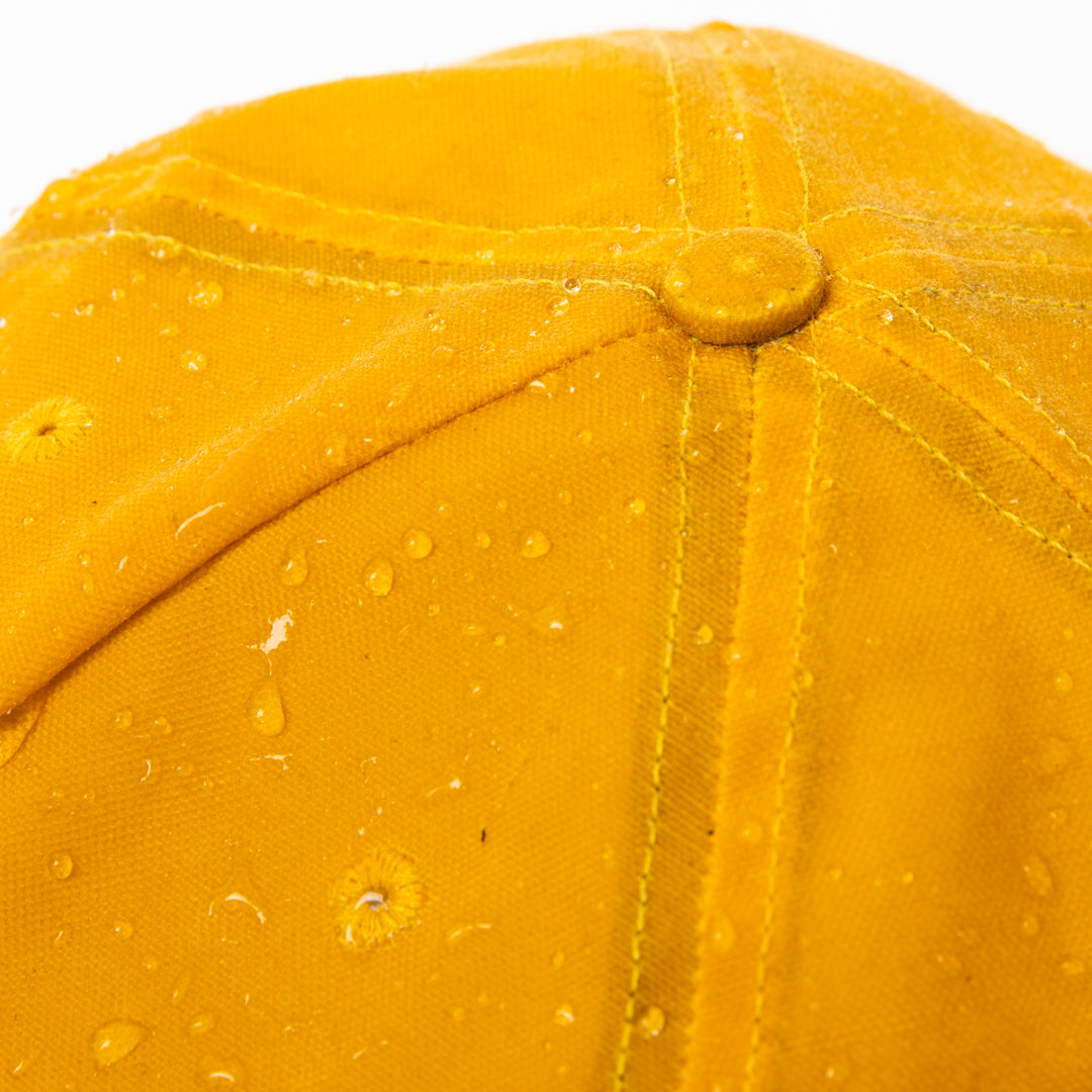 Water resistant yellow wax canvas hat made in USA by Ginew a Native American co.